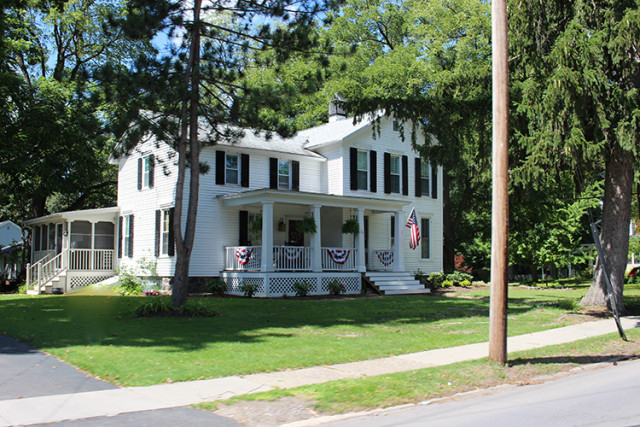 white-house-black-shutters-porch-east-aurora-NY