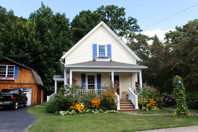 yellow-house-blue-shutters-east-aurora-NY