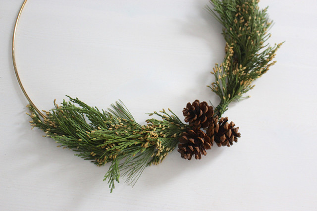 brass-ring-christmas-wreath-pinecones-added