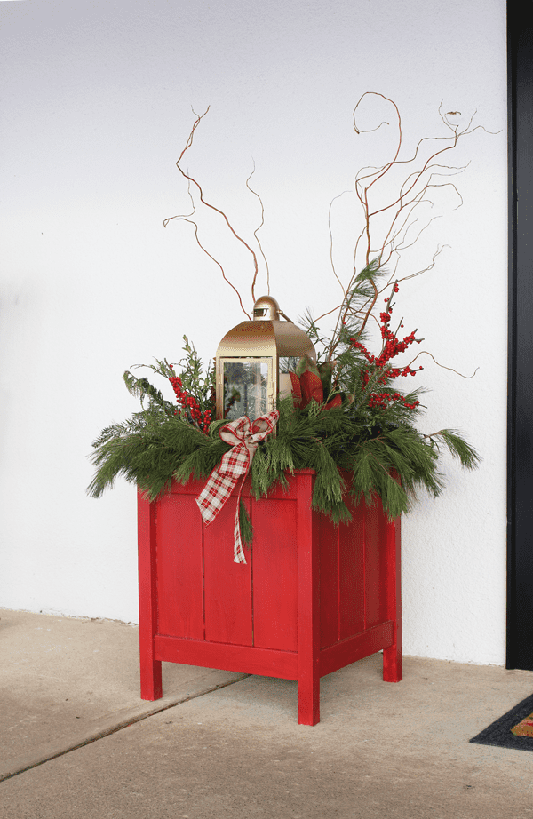 White Floral and Mixed Pine Christmas Centerpiece With Lantern